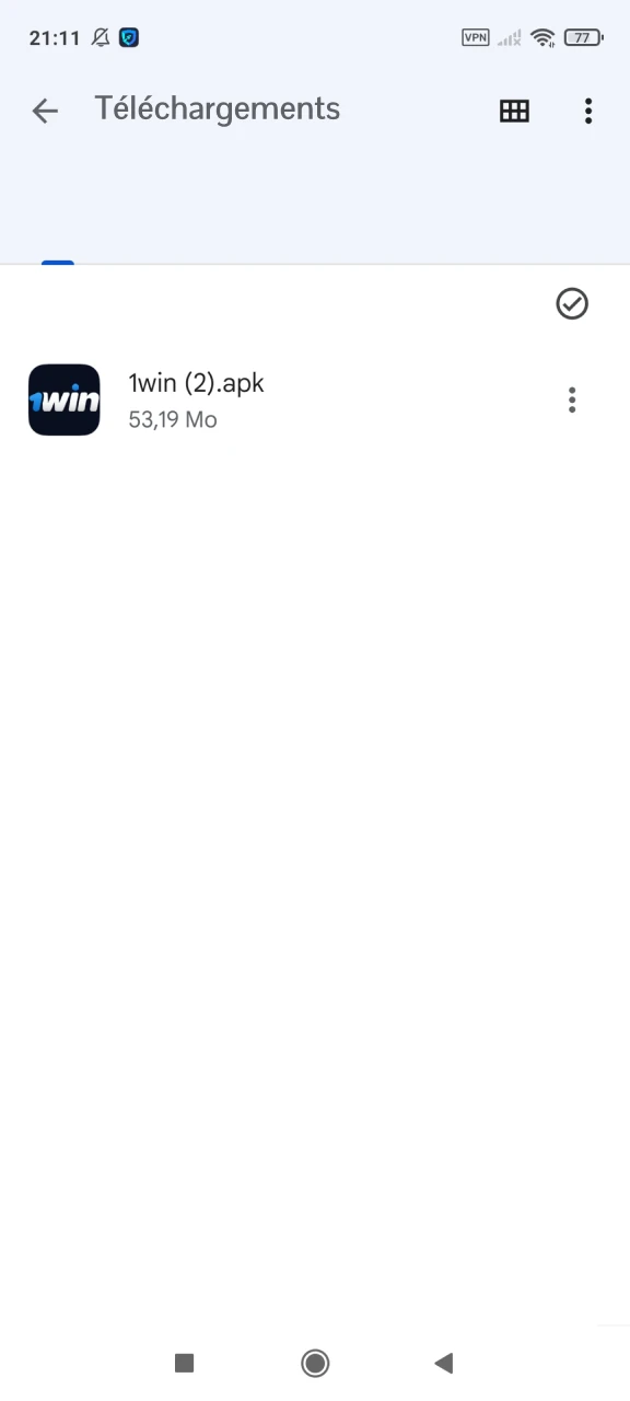Ouvrez le dossier contenant le fichier d’application 1win téléchargé.